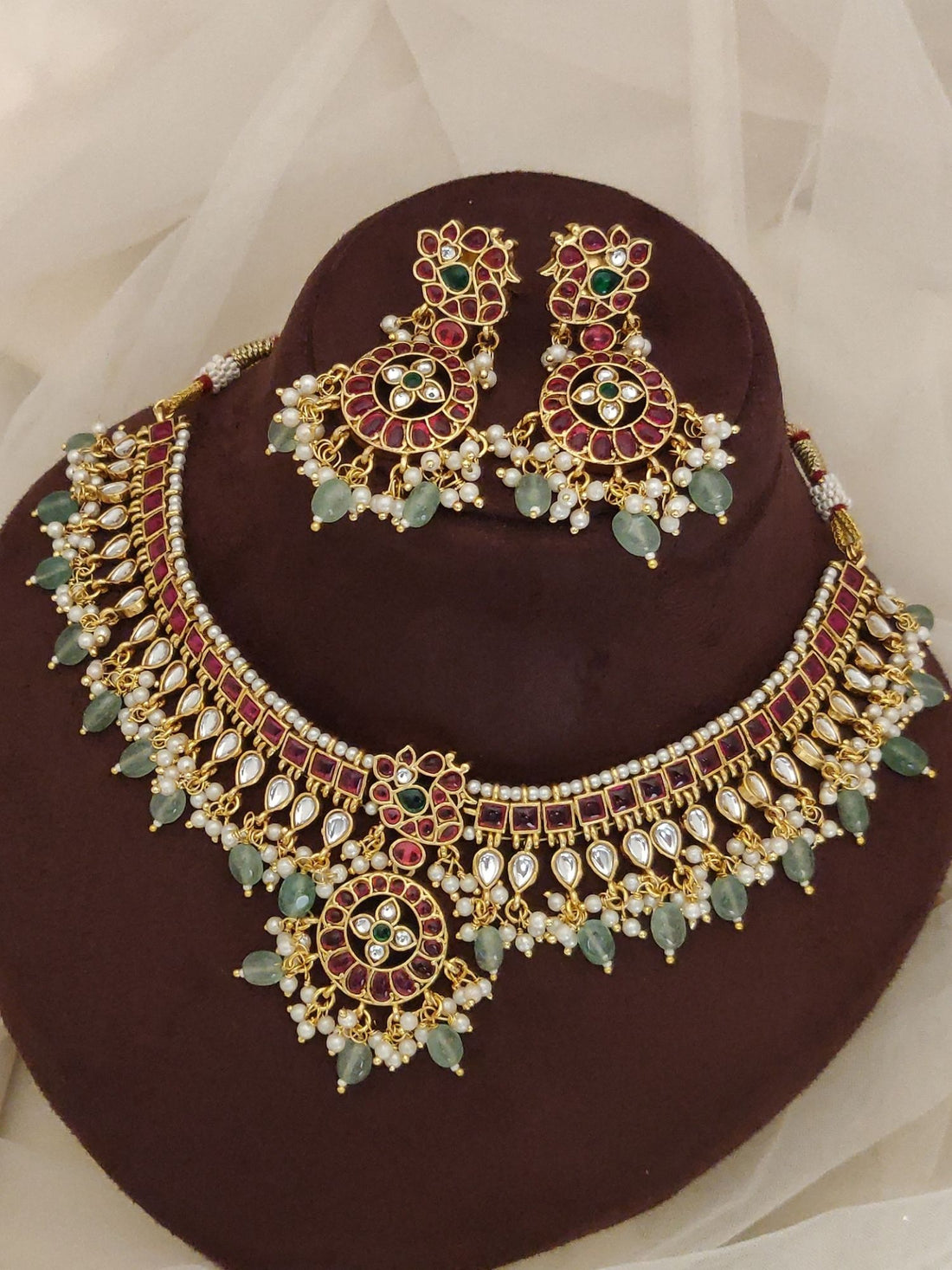 Abdesignsjewellery gold Kundan choker with red and green stones and pearl drops fashion statement necklace earrings combo