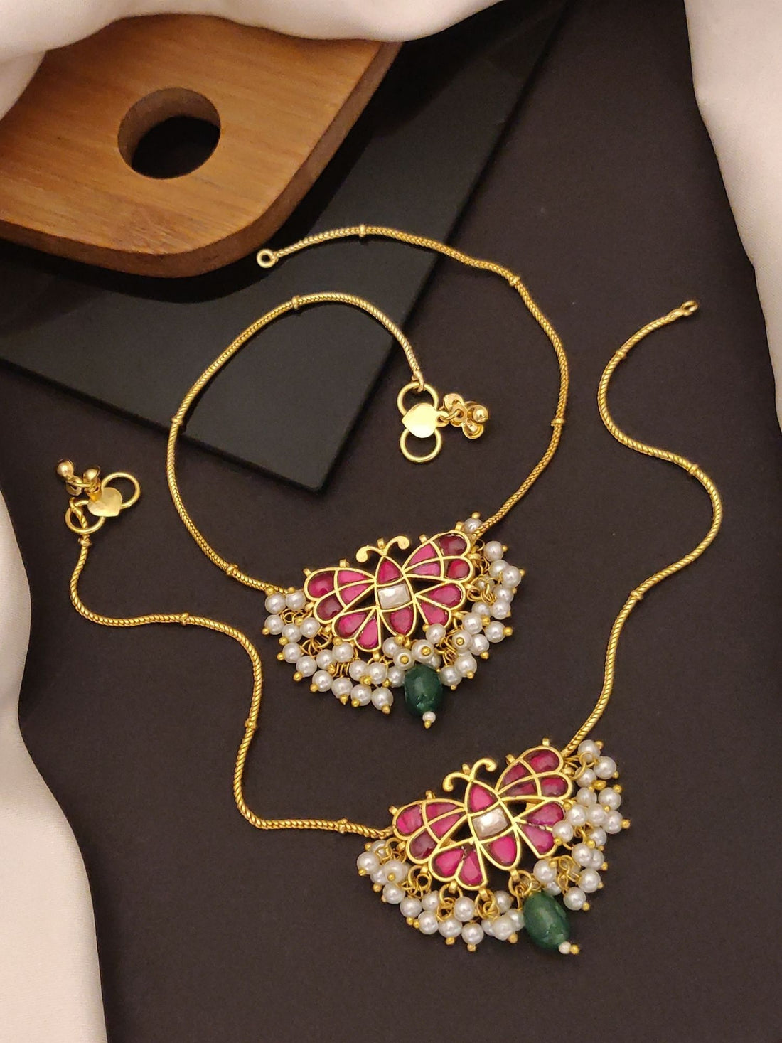 Abdesigns Jewellery Gold Butterfly Pearl Anklets Set featuring gold chains with pink butterfly and pearl accents