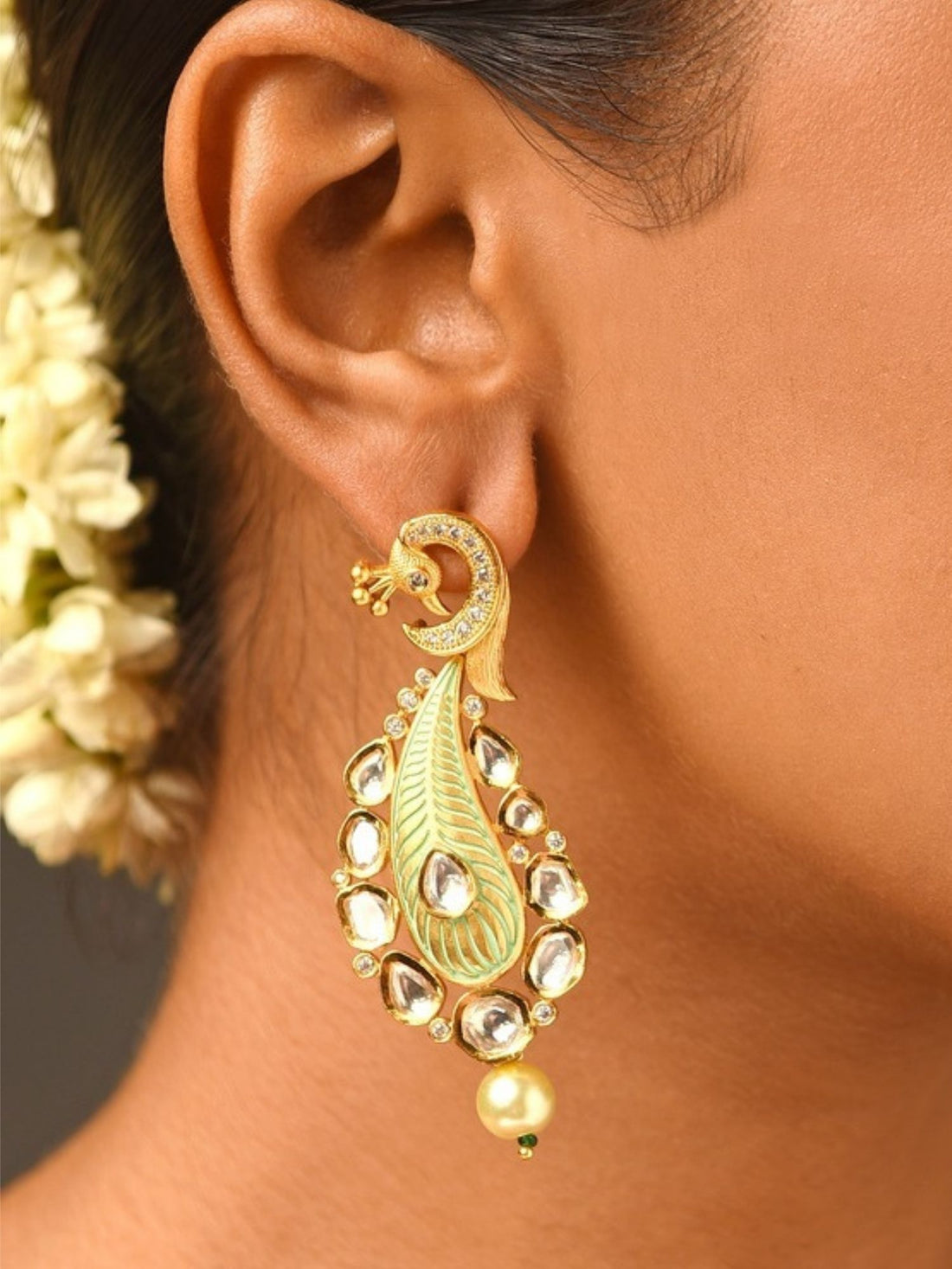 Gold Plated Polki Kundan Earrings worn on woman showcasing intricate traditional design