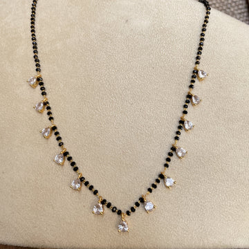 Mangalsutra pendant designs 2025 — 20 styles solitaire drops motif pearl traditional — Abdesigns