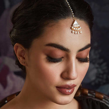 Elegant Maang Tikkas showcased in the best online artificial jewellery store in Surat for women