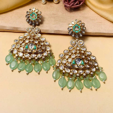 Pair of traditional Kundan Earring with intricate gold design and green bead accents