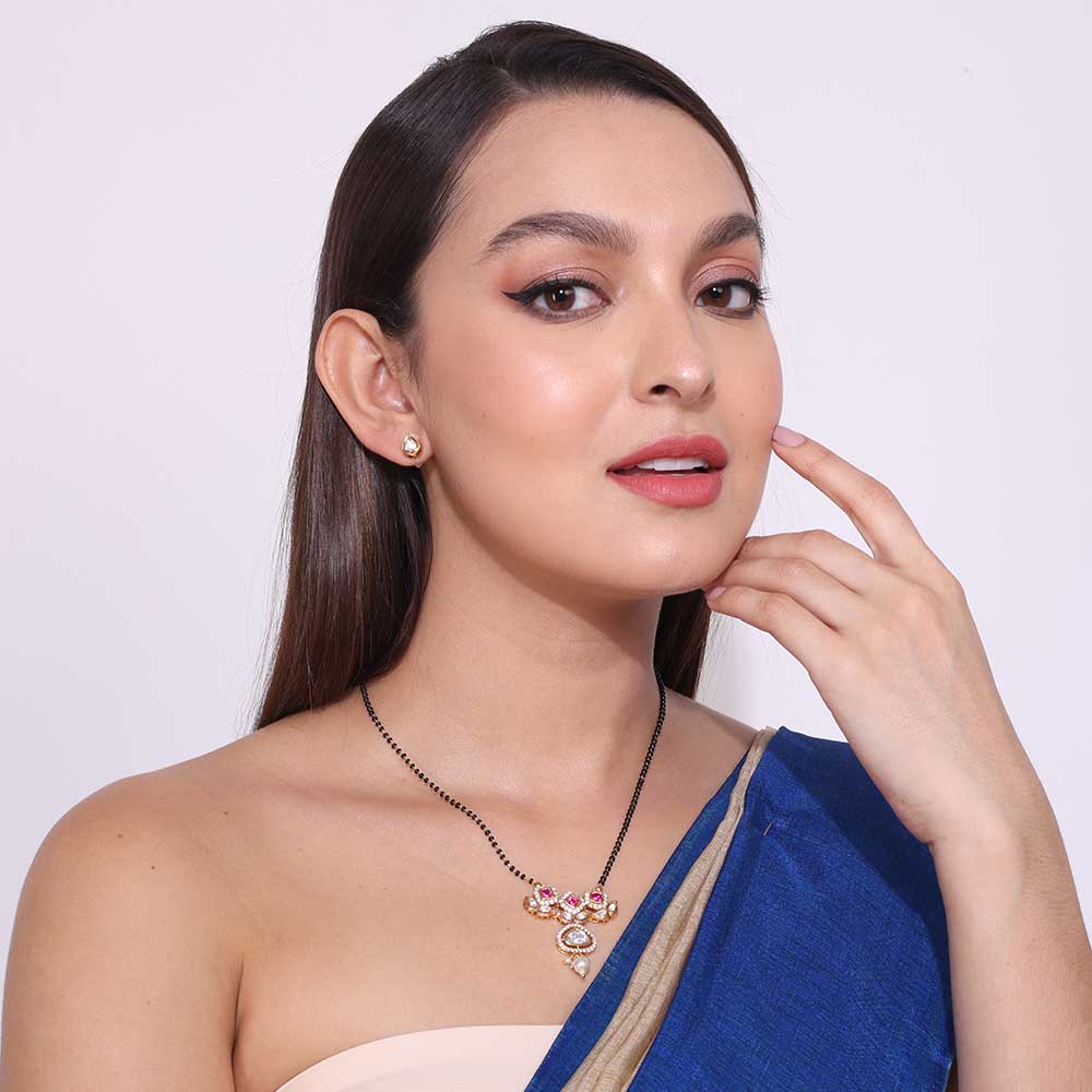 Elegant Kundan Mangalsutra worn by woman with traditional attire and subtle makeup