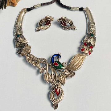 Oxidise German silver necklace with intricate floral and peacock design and matching earrings