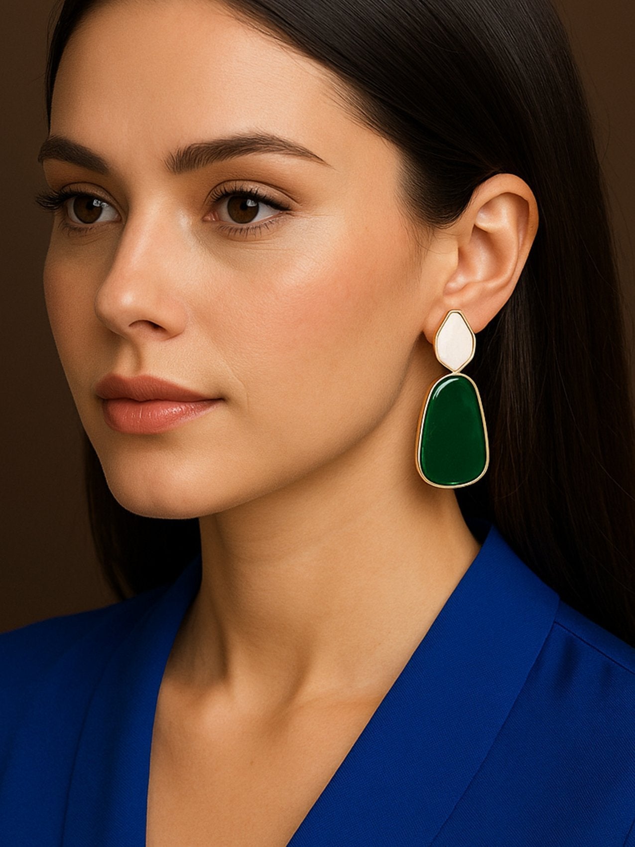 Close-up of a person wearing a round stud dailywear earring with sparkling details