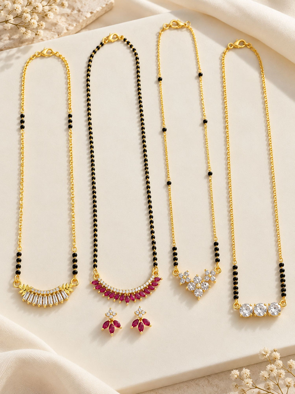 Set of 4 Gold Plated AD Stone Black Bead Mangalsutra Necklaces with Earrings for Women