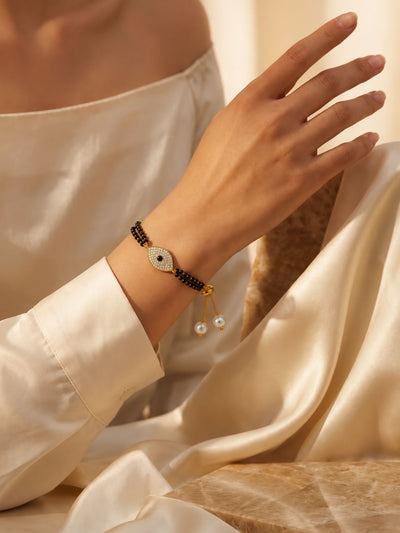 Gold Plated Evil Eye AD Stone Hand Mangalsutra Bracelet for Women