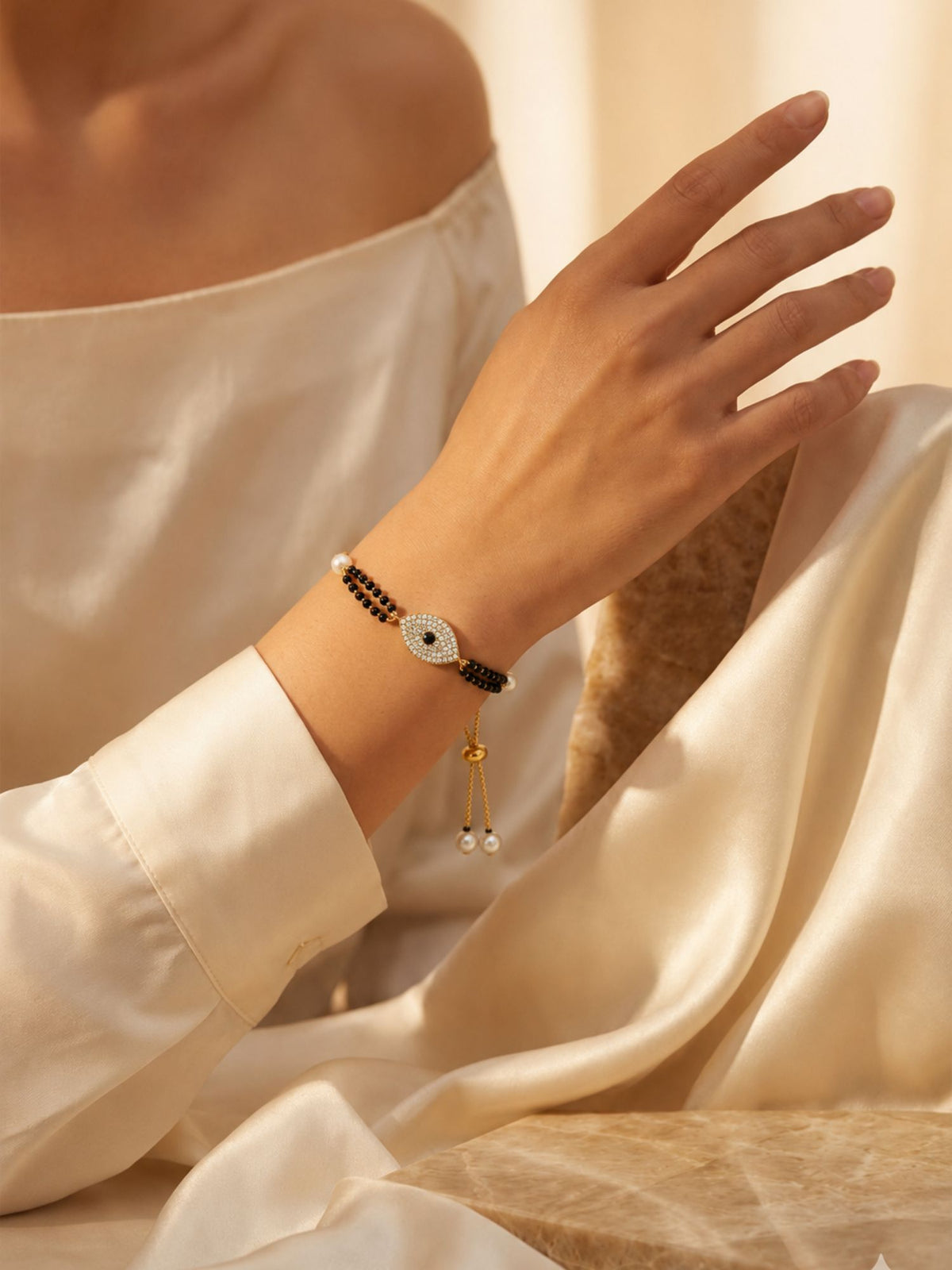 Gold Plated Evil Eye AD Stone Hand Mangalsutra Bracelet for Women