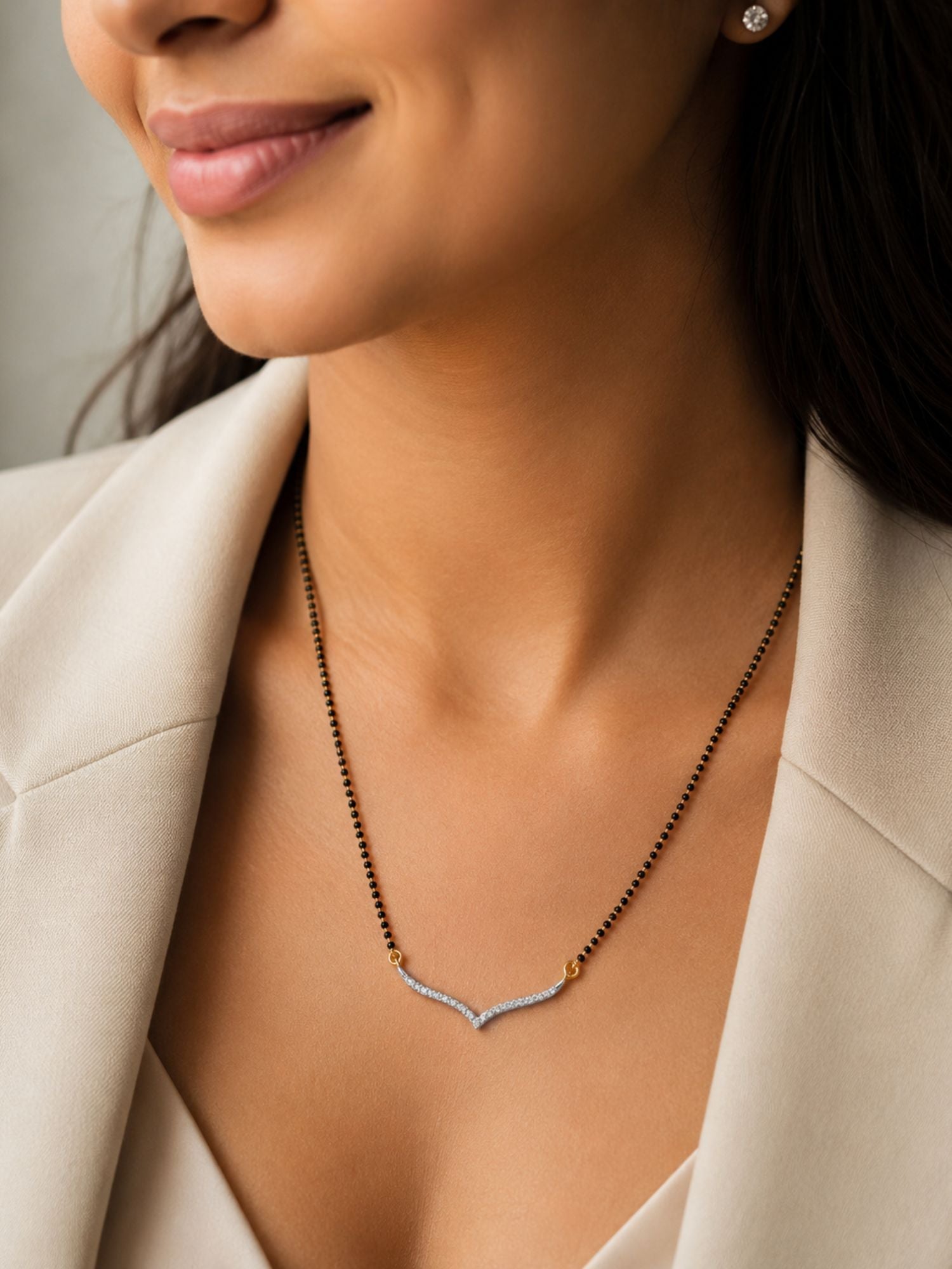 Solitaire mangalsutra gold plated black bead chain flatlay — Abdesigns