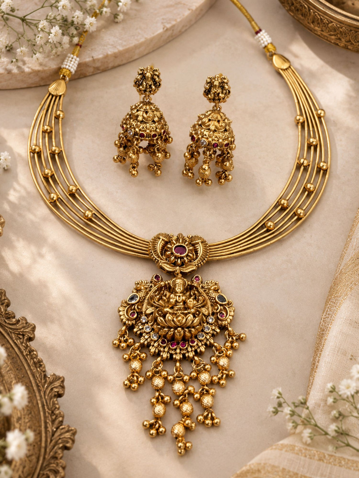 Gold Plated Temple Lakshmi Hasli Necklace Set with Jhumka Earrings