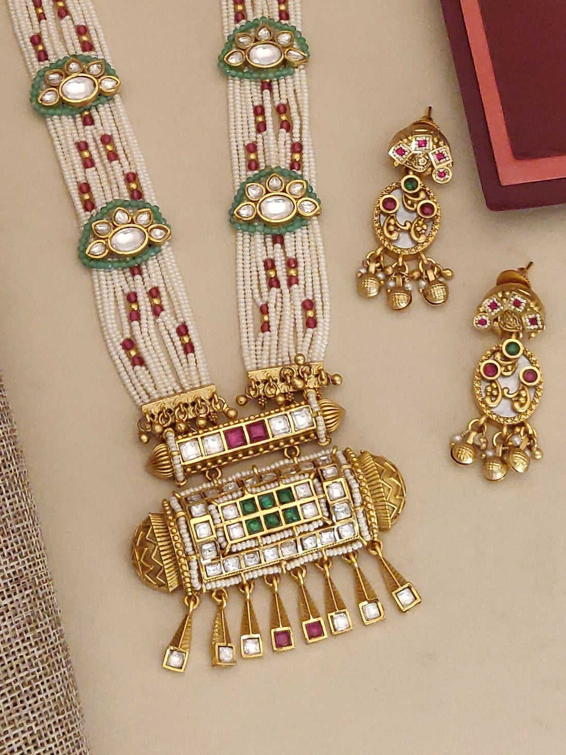 Elegant Gold Plated Necklace with intricate design featuring pearls and colorful stones