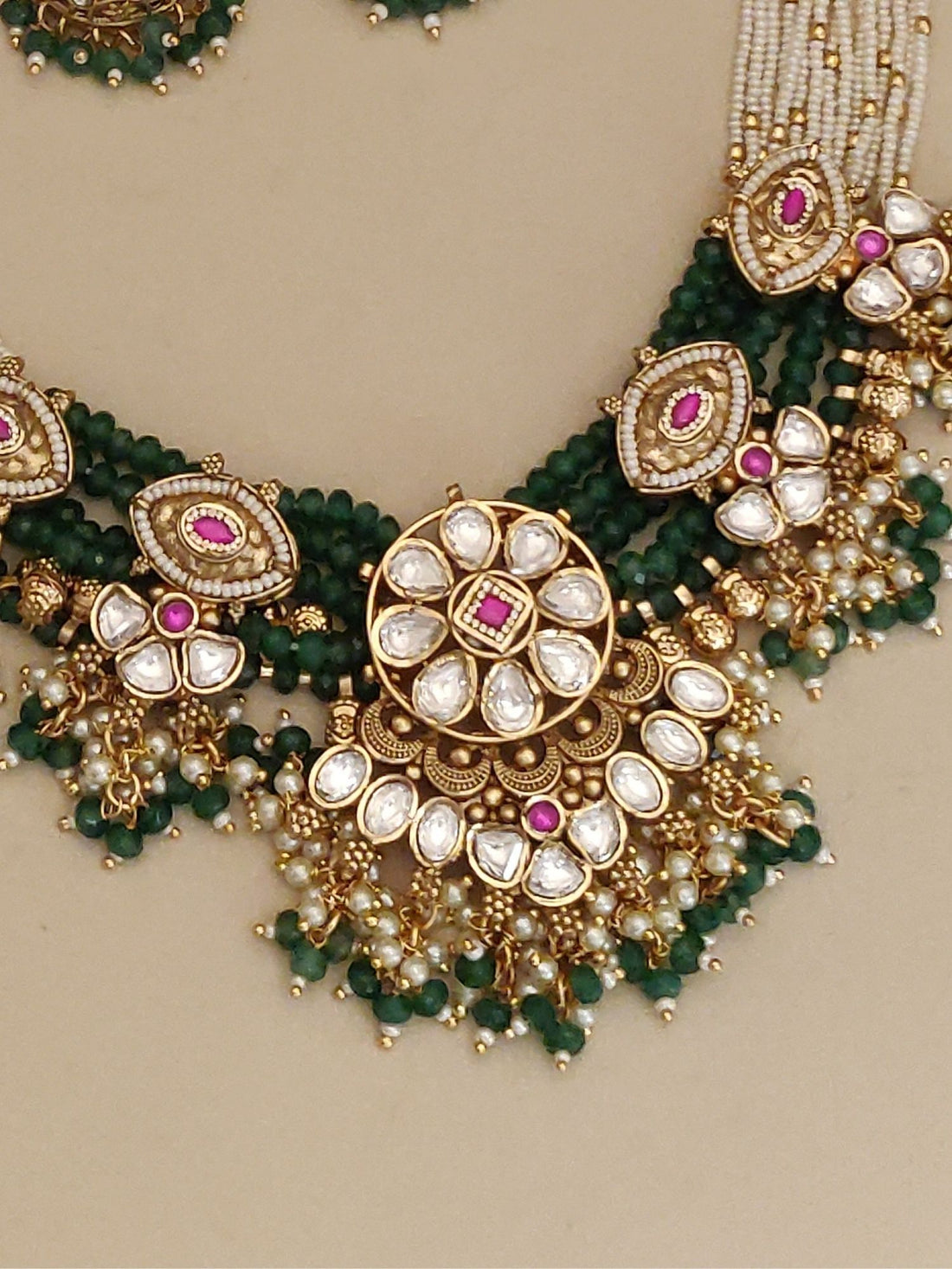 Elegant gold plated necklace with intricate designs and matching earrings for a stunning look