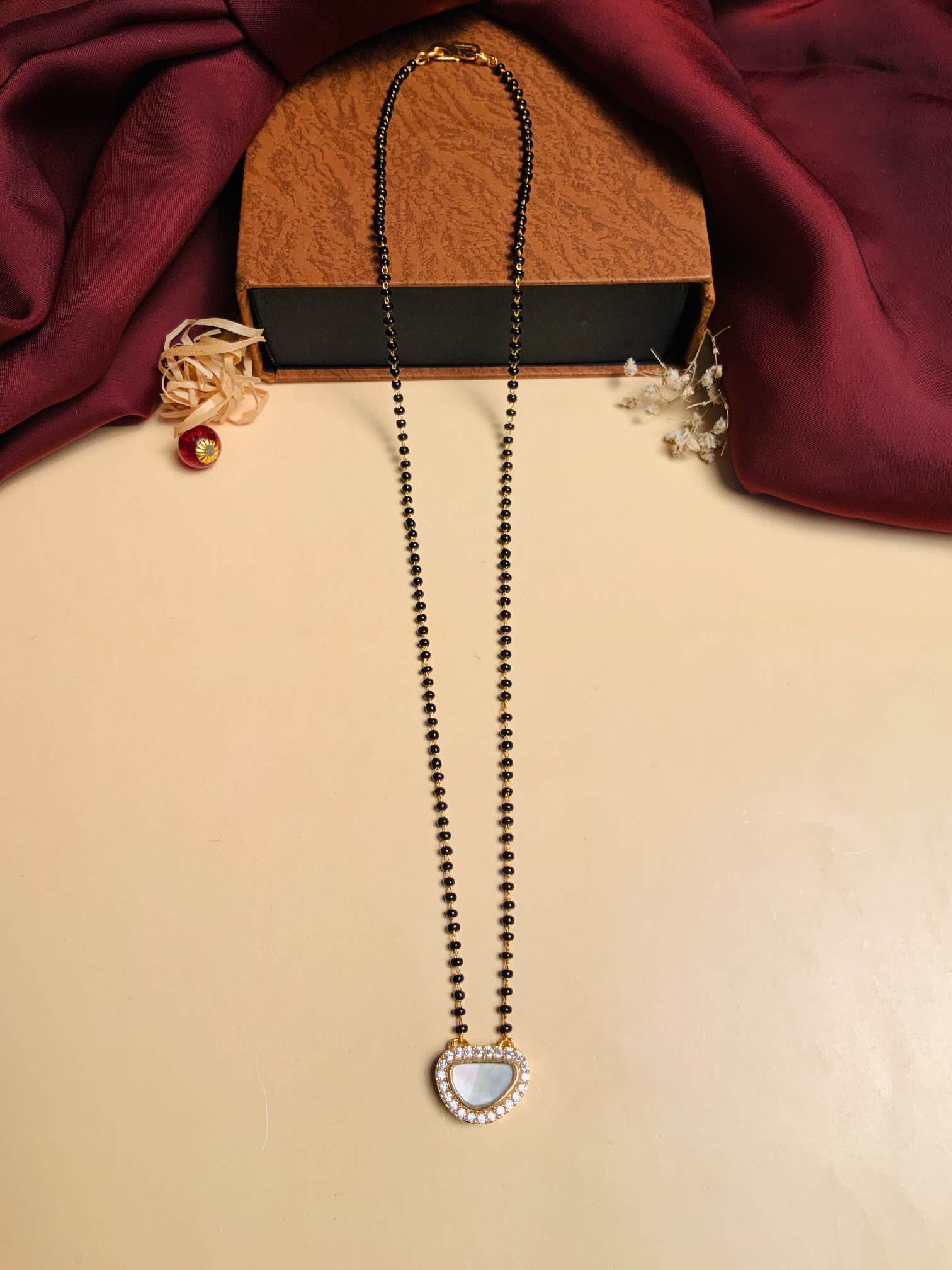 Pleasing Mother Pearl Gold Plated Mangalsutra
