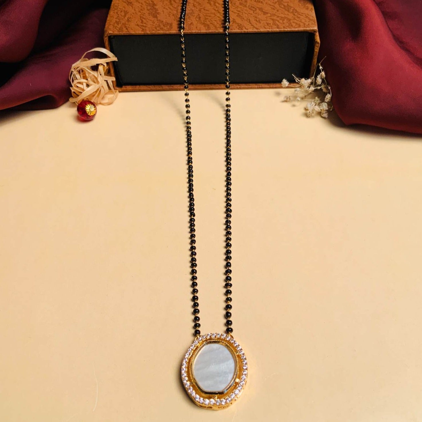 Bewitching Mother Pearl Gold Plated Mangalsutra - Abdesignsjewellery