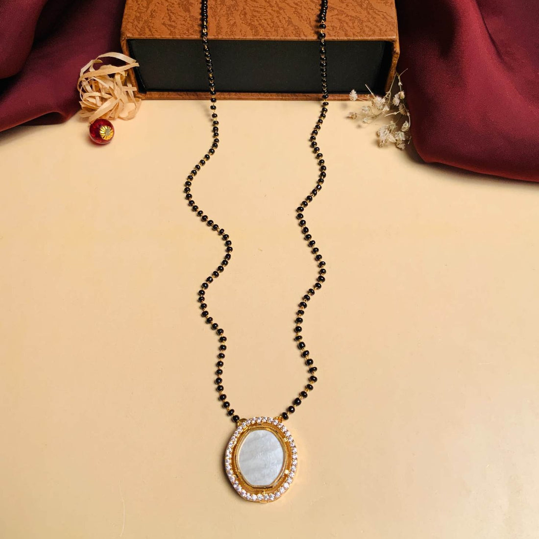 Bewitching Mother Pearl Gold Plated Mangalsutra - Abdesignsjewellery