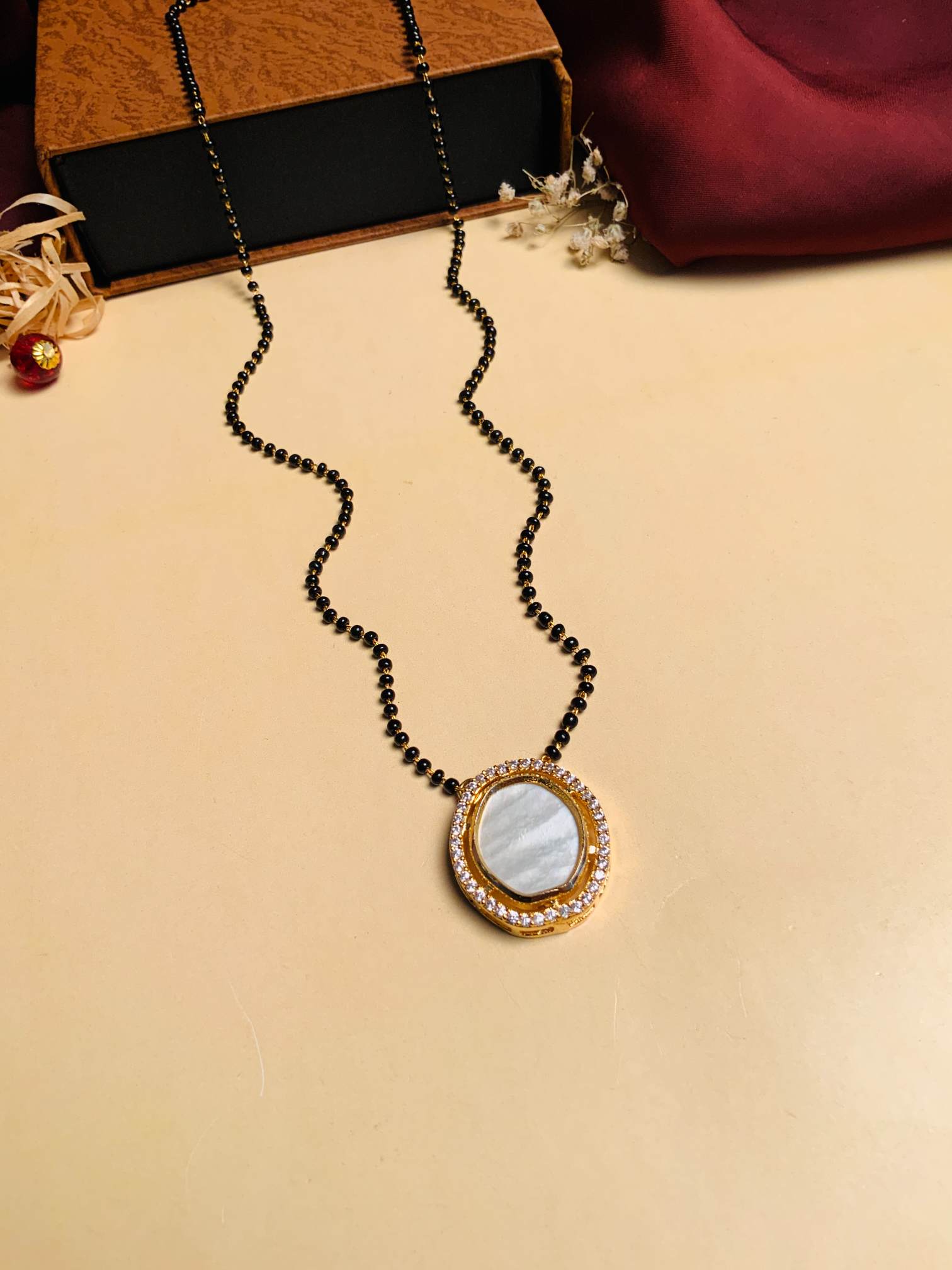 Bewitching Mother Pearl Gold Plated Mangalsutra - Abdesignsjewellery