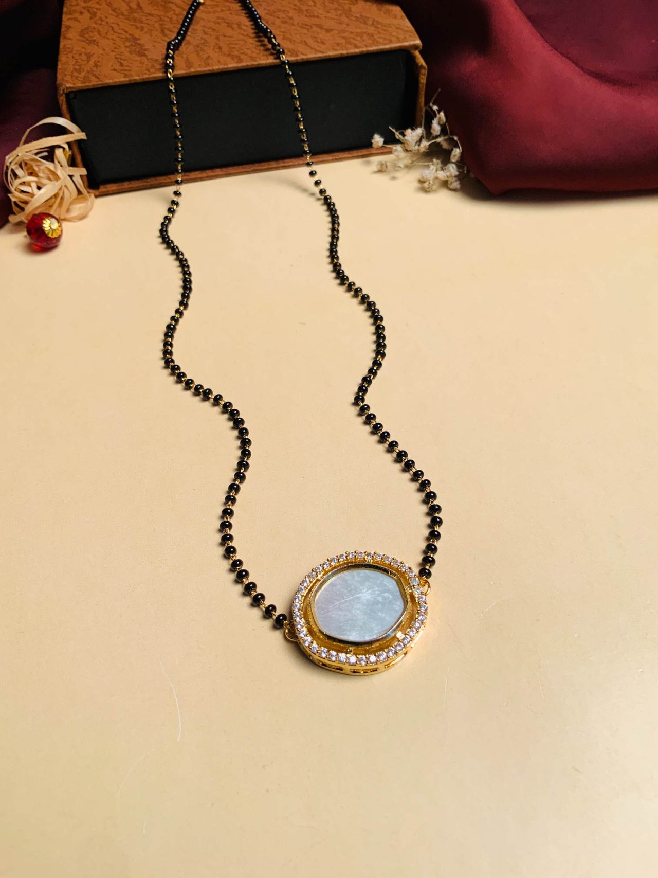 Bewitching Mother Pearl Gold Plated Mangalsutra - Abdesignsjewellery