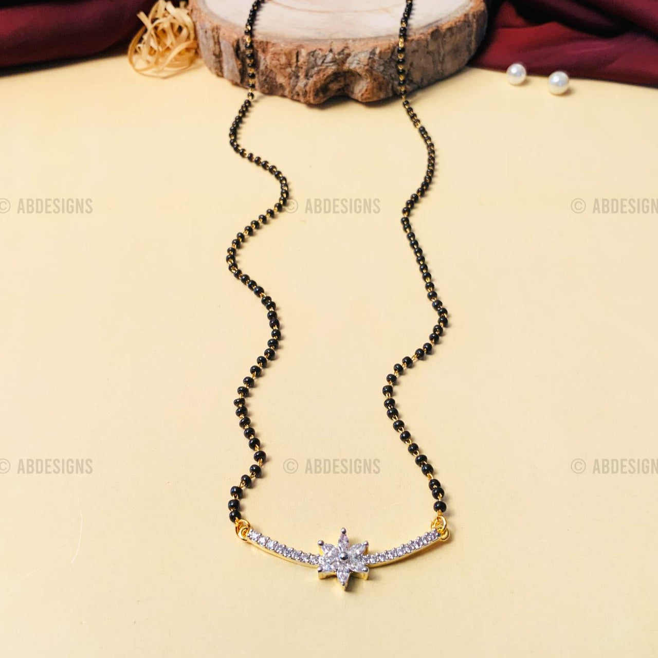 Elegant Gold Plated V-Shape American Diamond Flower Mangalsutra