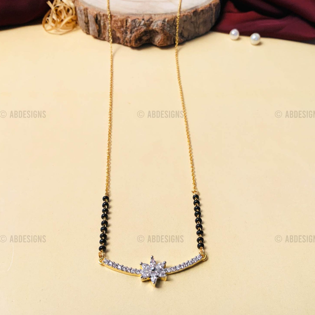 Elegant Gold Plated V-Shape American Diamond Flower Mangalsutra