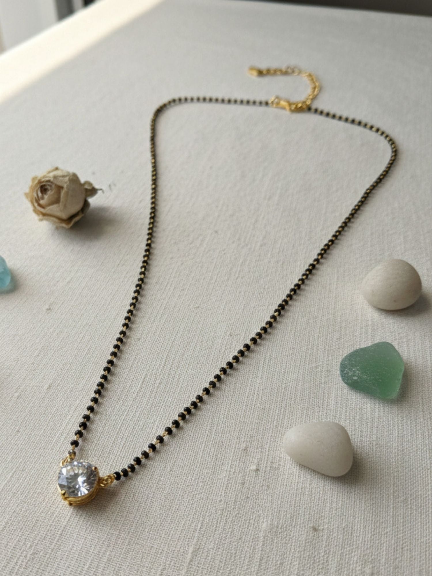 gold american diamond mangalsutra