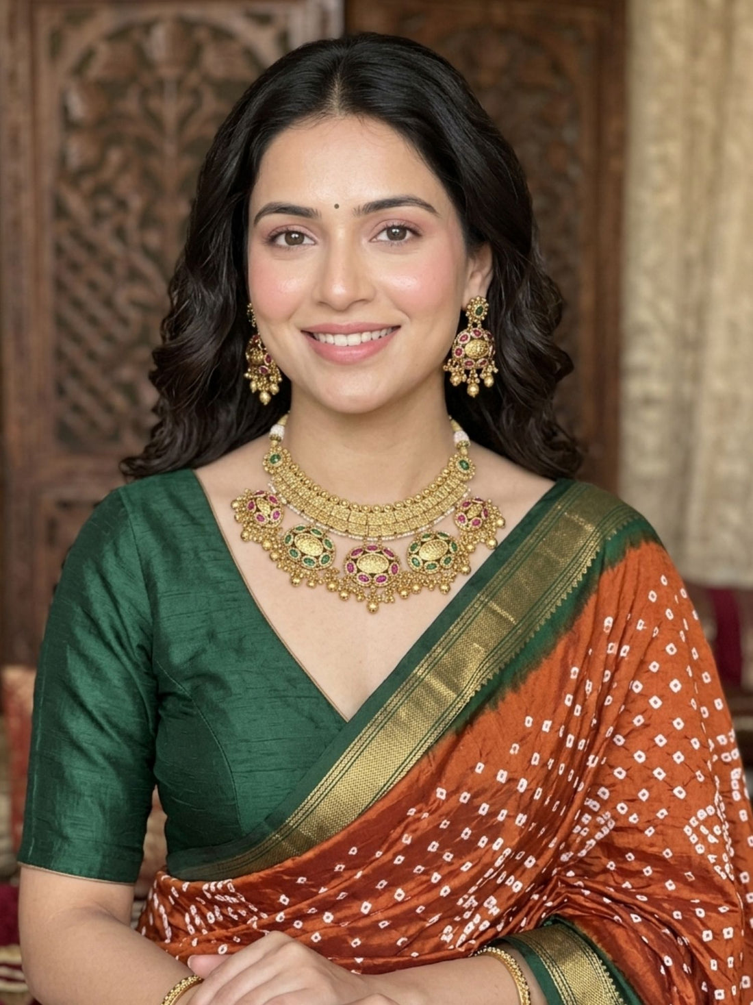 Bride wearing Abdesigns gold jadau kundan bridal necklace set styled with traditional Indian wedding attire