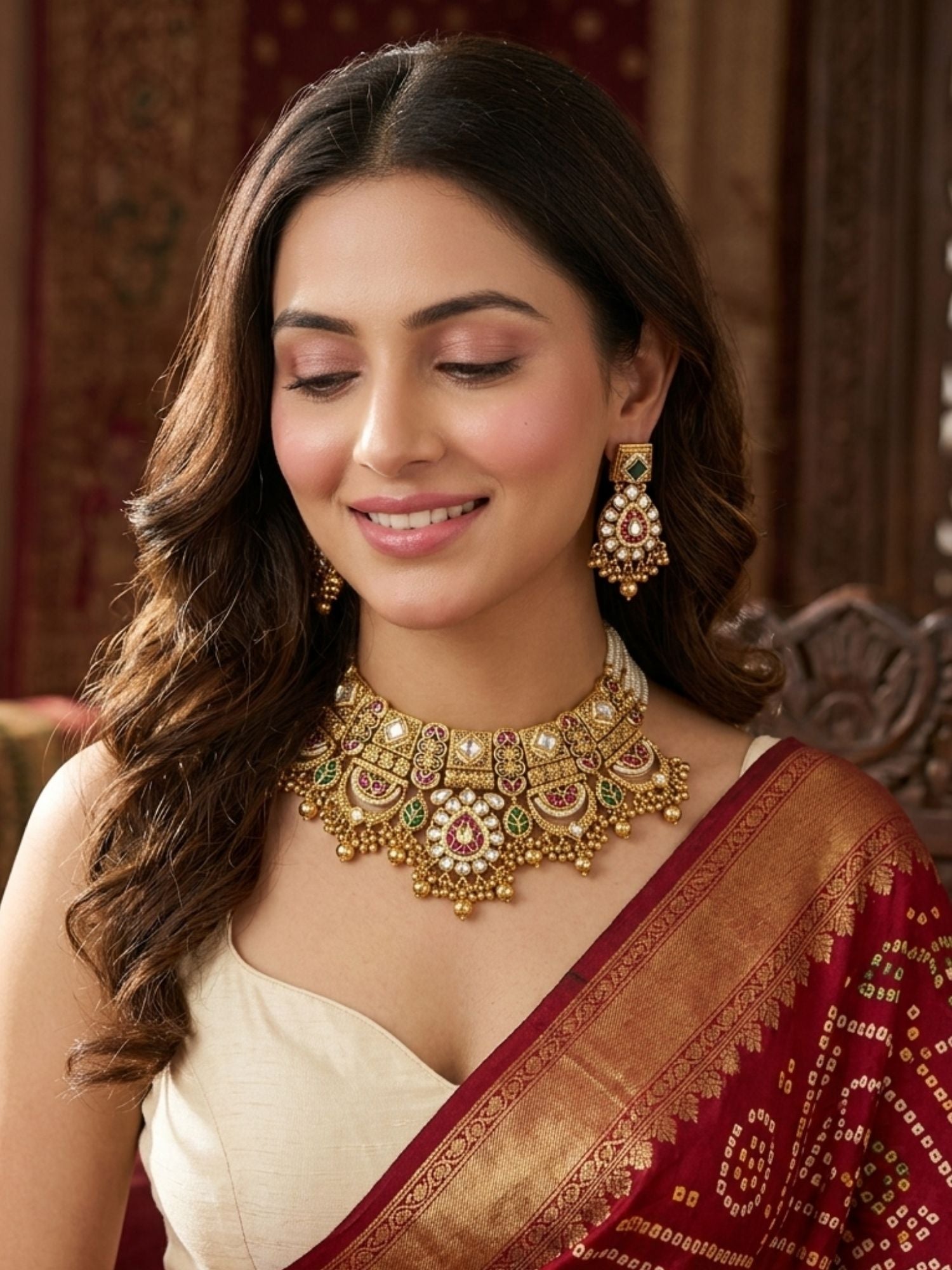 Bride wearing Abdesigns gold bridal wedding necklace set styled with traditional Indian wedding attire