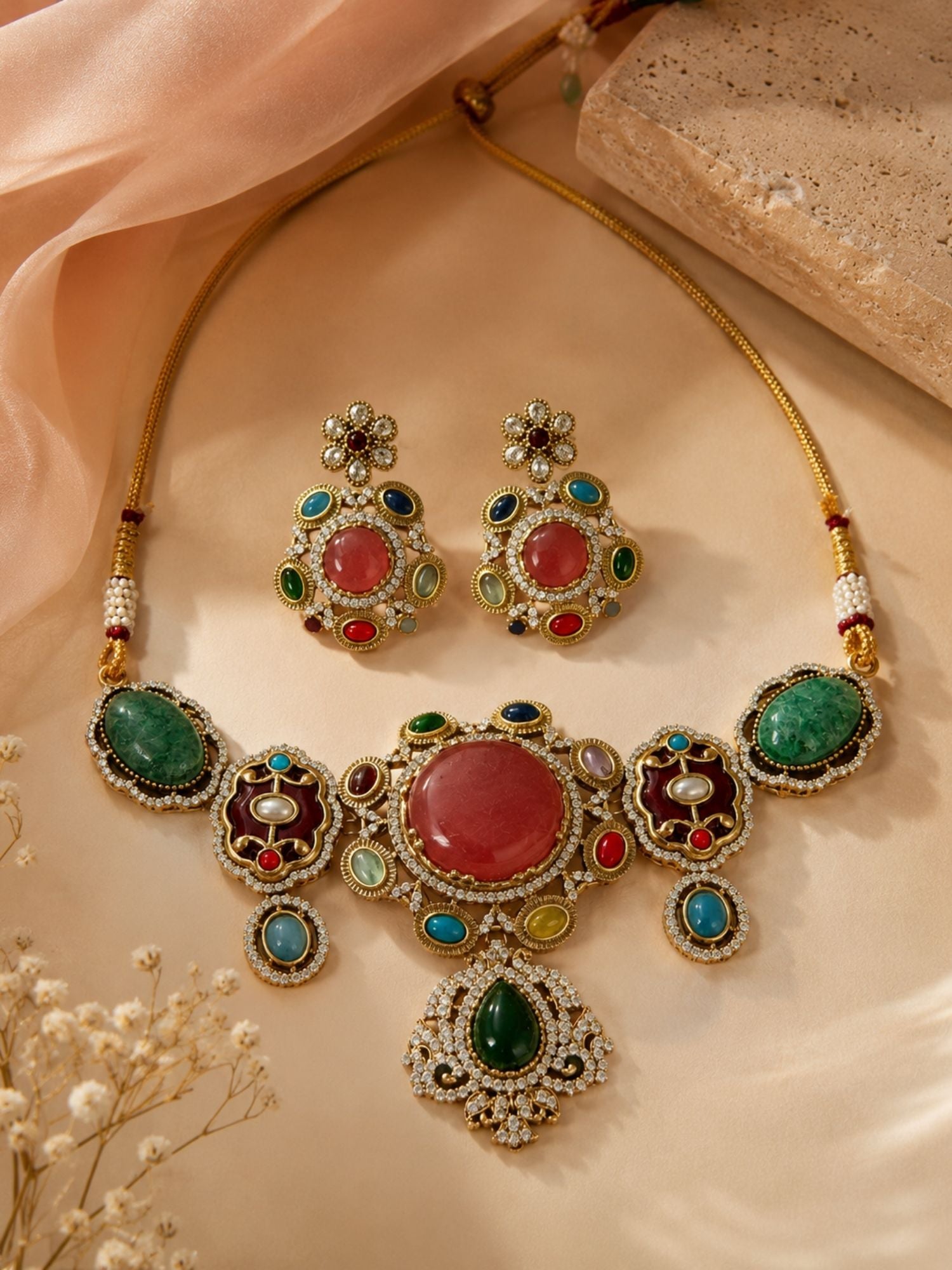 Model wearing Victorian gold-plated multicolor gemstone choker necklace