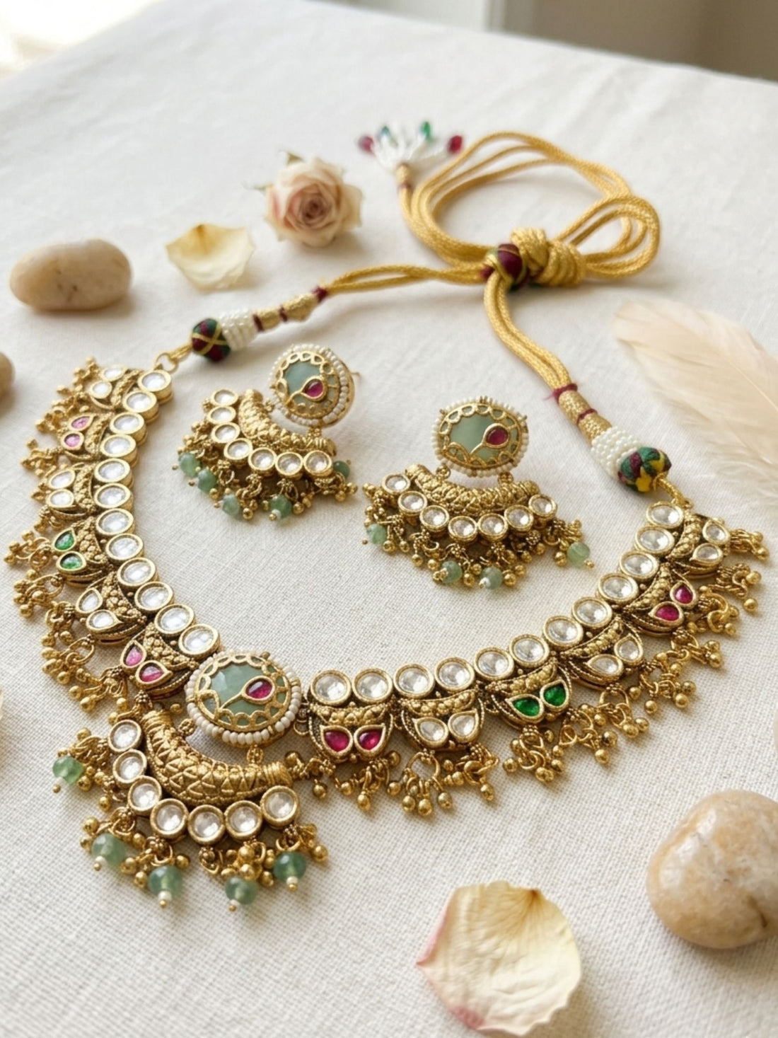 Woman wearing Abdesigns gold antique polki necklace set styled with traditional Indian ethnic outfit