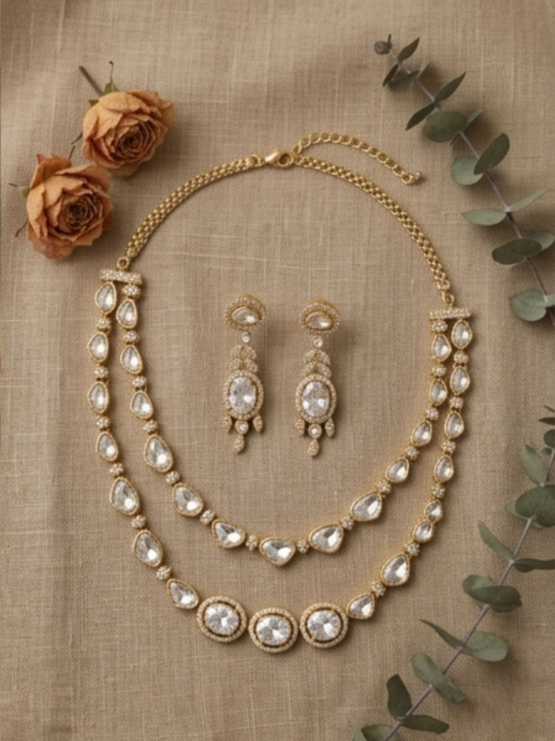 Woman wearing Abdesigns multilayer American diamond necklace set styled with elegant party and wedding outfit