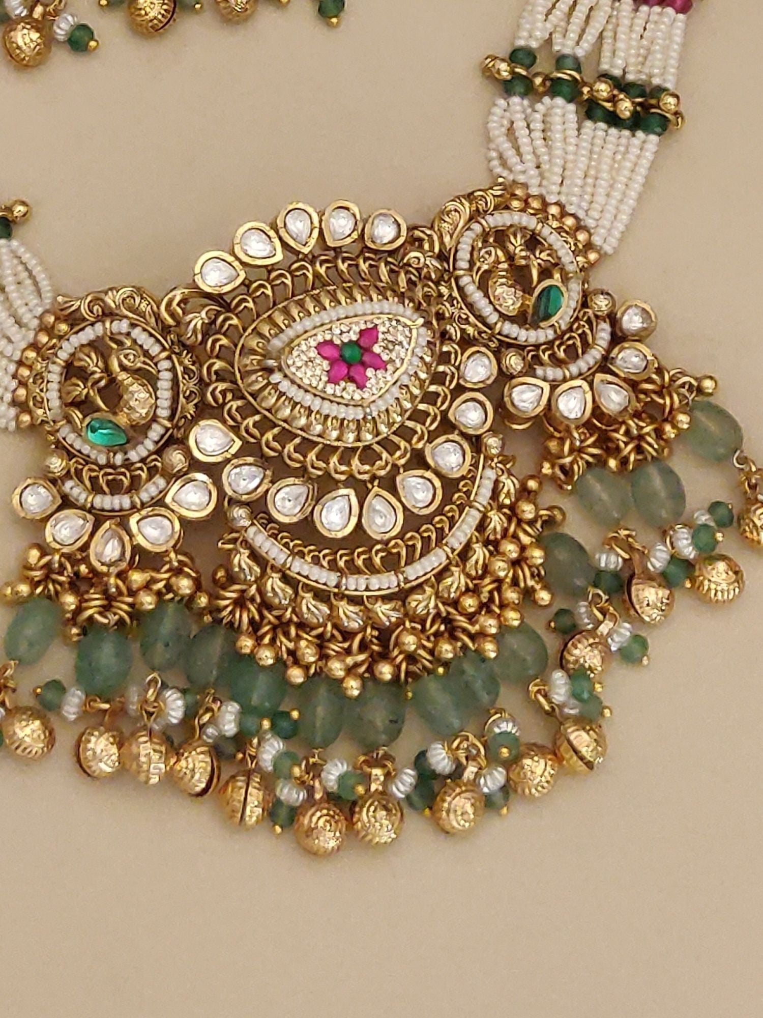 Abdesignsjewellery gold plated Ahmedabadi choker necklace set with white seed beads green stone danglers