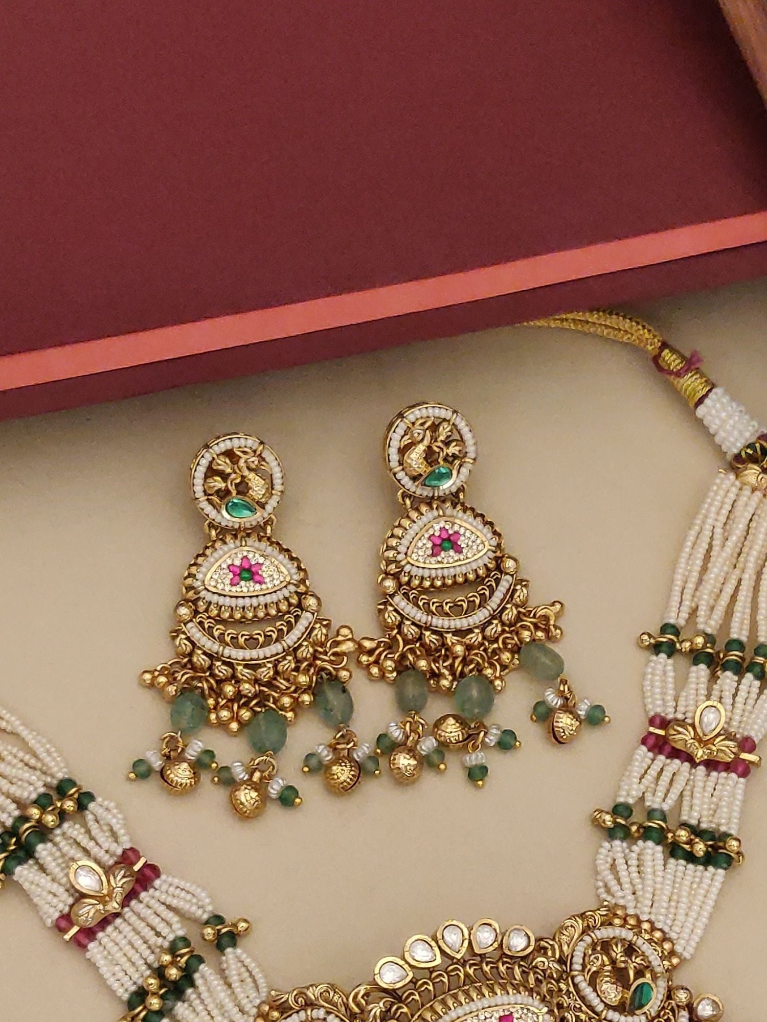 Abdesignsjewellery gold plated Ahmedabadi choker necklace set with multi strand pearl beads and green pink stone earrings