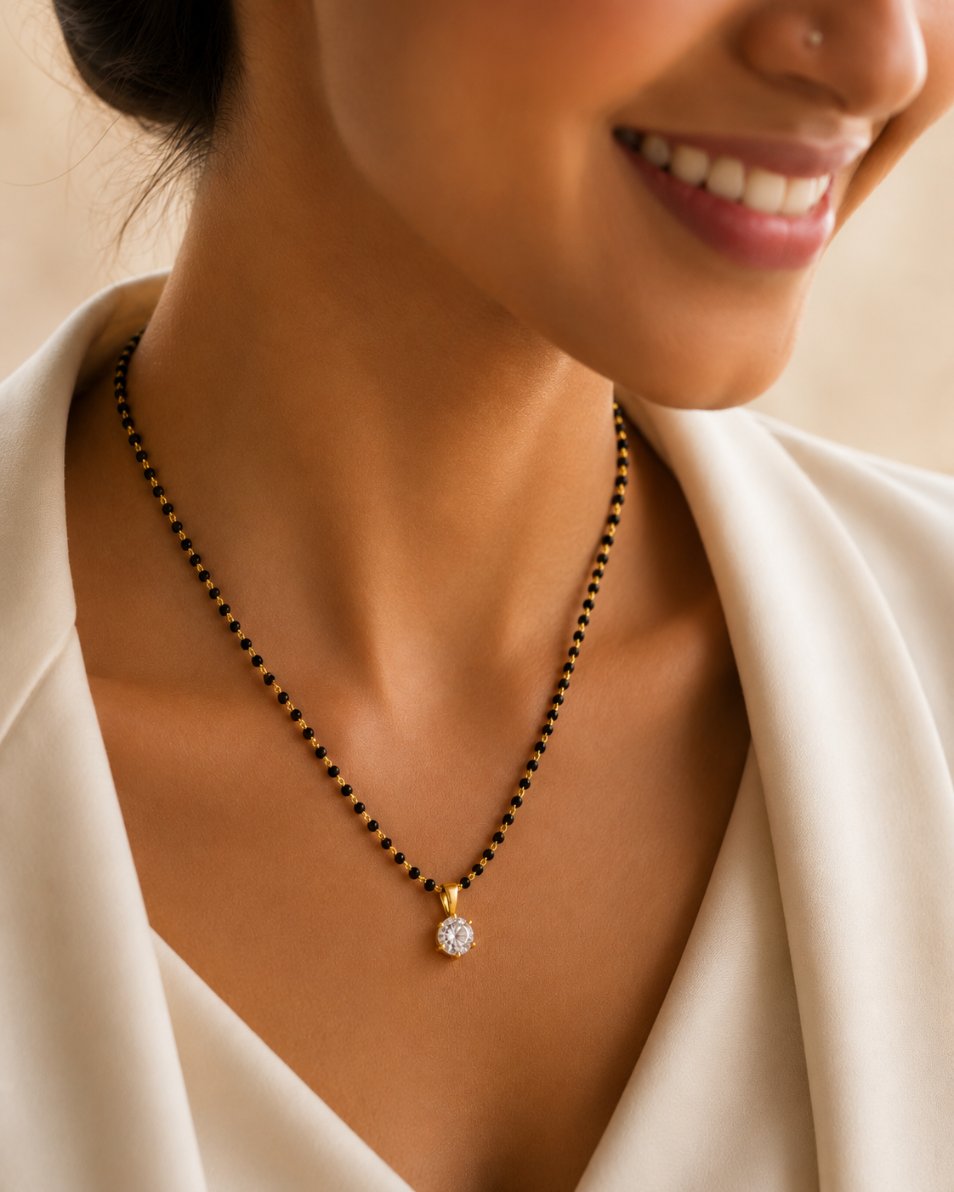 Mangalsutra side profile on model — elegant gold tone with black bead chain