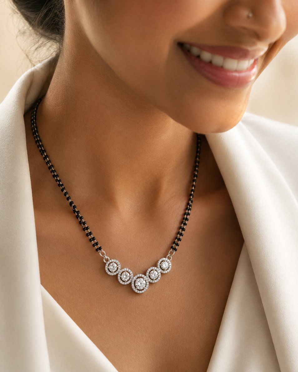 Dainty mangalsutra with black bead chain — front view on model neck