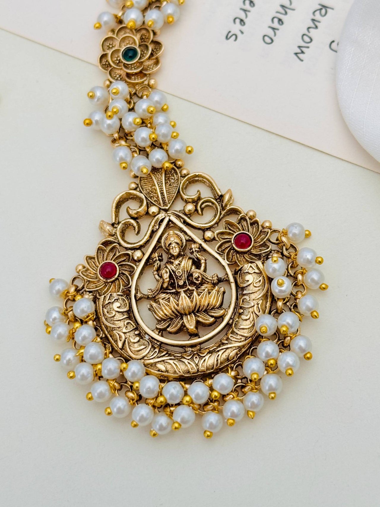 Finely-crafted Matt Gold Plated Goddess Laxmi Maangtikka