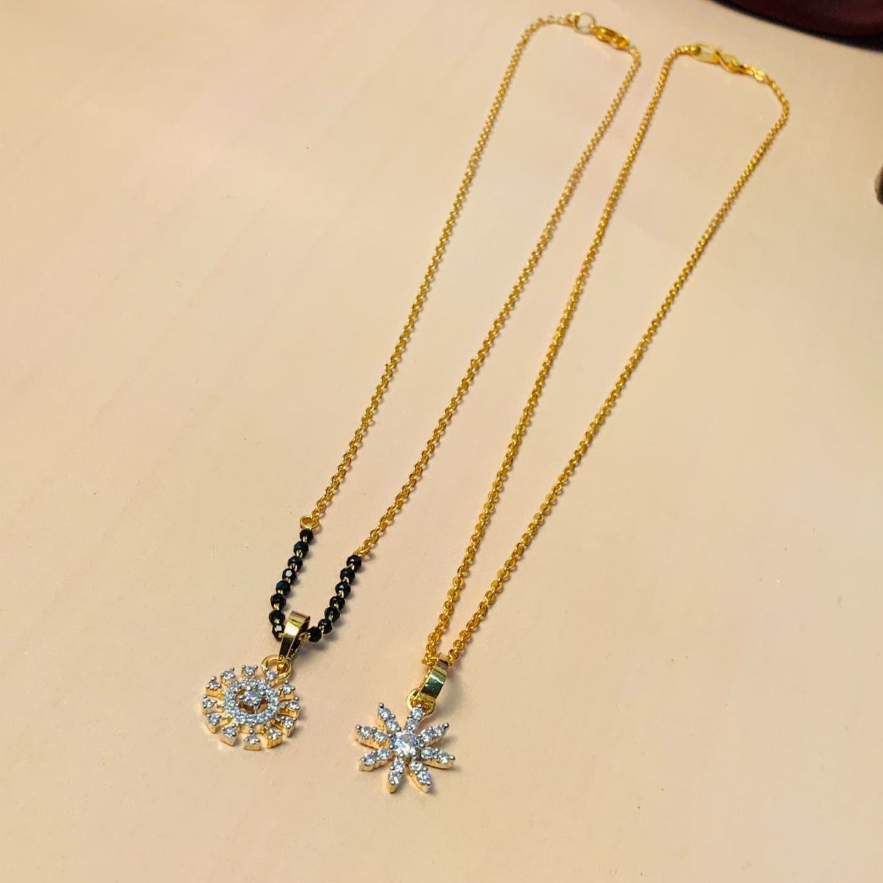 Fascinating Gold Plated American Diamond Mangalsutra & Pendant Chain Combo