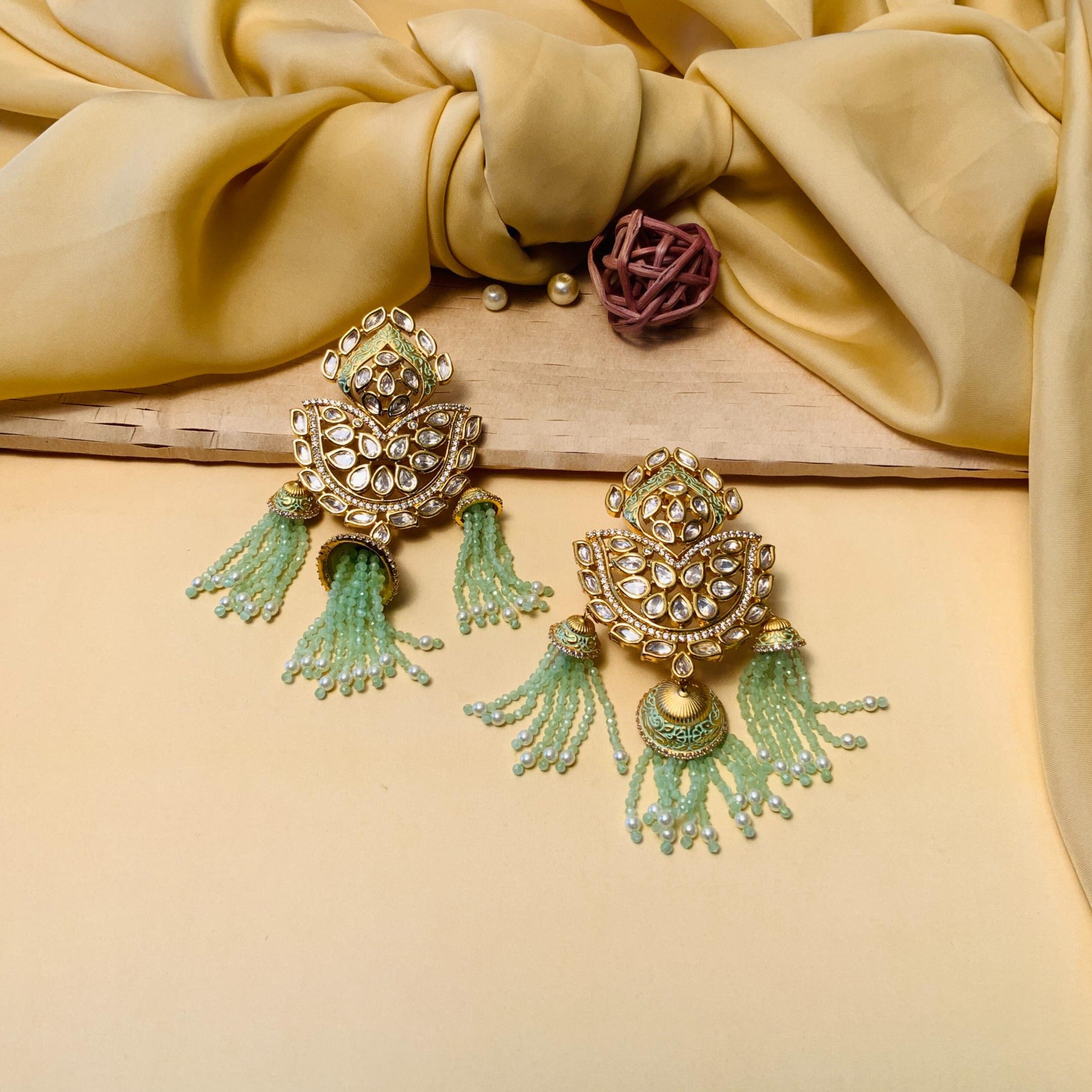 Pleasing Gold Plated Kundan Beaded Drop Earrings