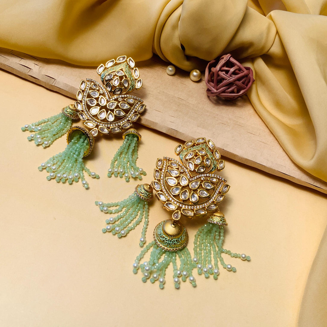 Pleasing Gold Plated Kundan Beaded Drop Earrings