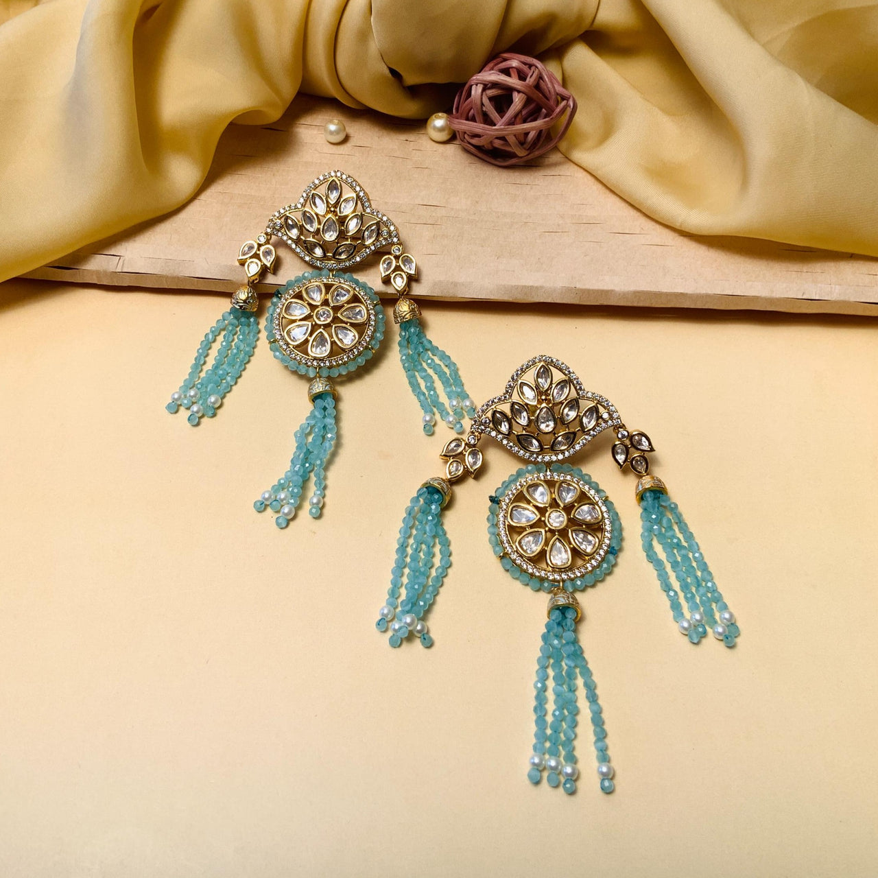 Pleasing Gold Plated Sky Blue Beads Kundan Earrings