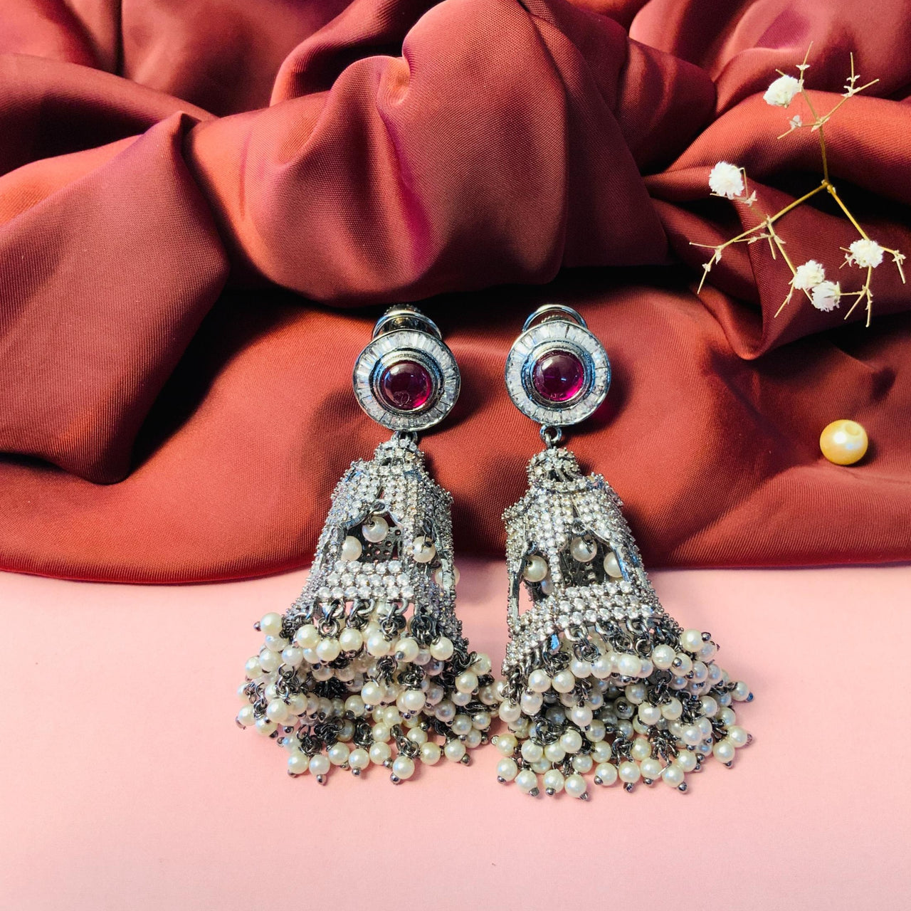 Ethnic Ruby & Pearl Studded American Diamond Silver Plated Jumkhi Earrings