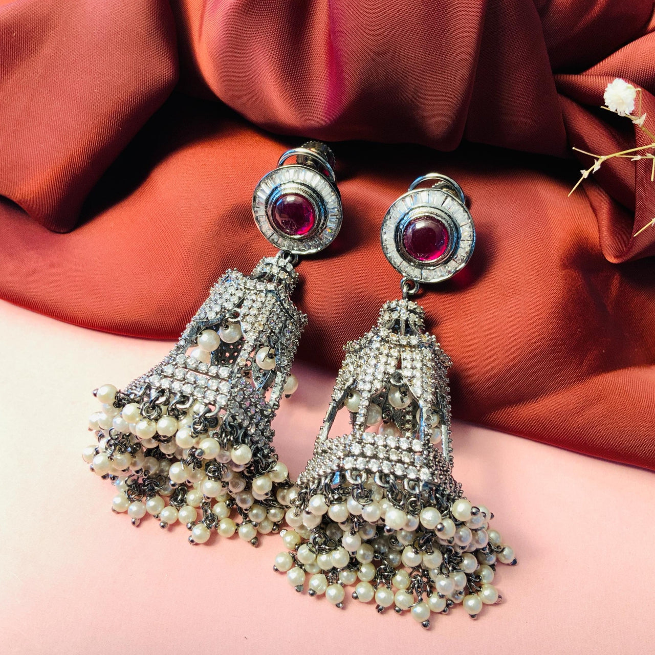 Ethnic Ruby & Pearl Studded American Diamond Silver Plated Jumkhi Earrings
