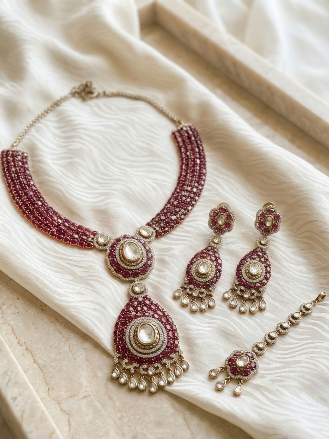 Woman wearing Abdesigns polki Victorian style necklace set styled with luxurious traditional Indian outfit