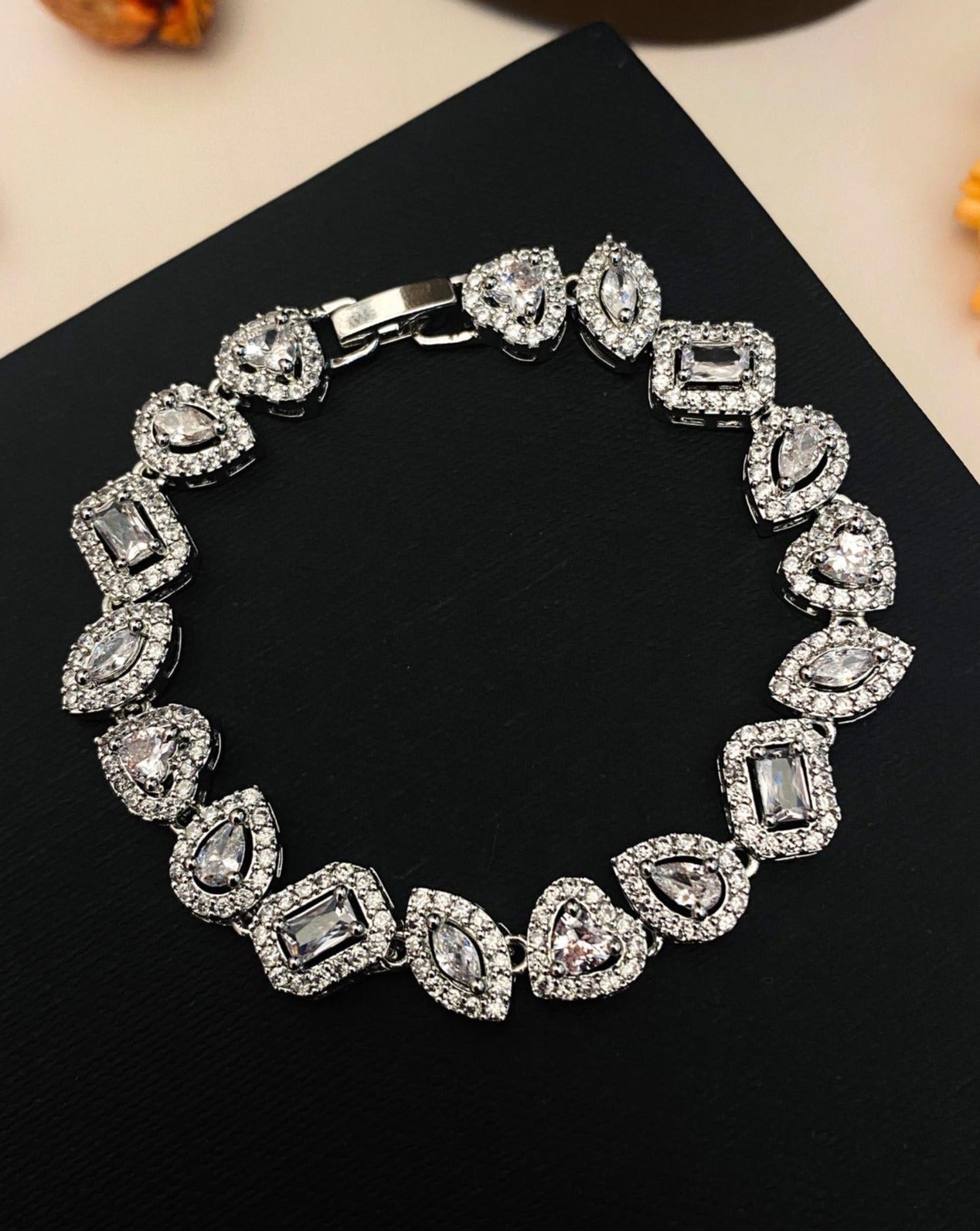 Orange Latkan American Diamond (AD) Bangle Set | Bangle set, Bridal  jewellery online, American diamond jewellery