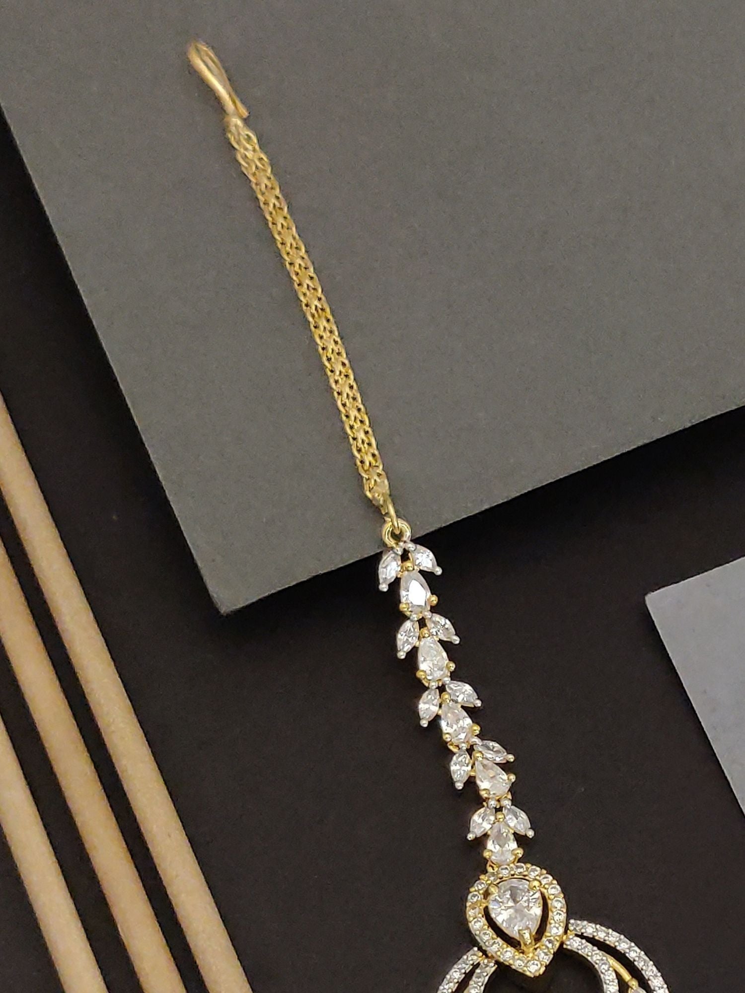 Abdesigns Gold Plated CZ Bridal Maangtikka with leaf cluster chain and teardrop CZ pendant