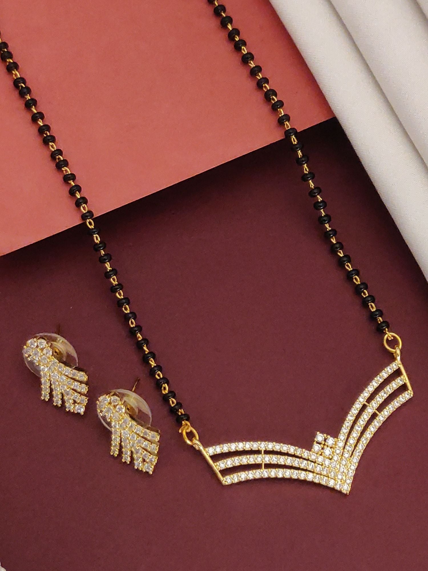 Abdesigns Gold-Plated CZ Mangalsutra with Earrings.. black bead chain V shaped CZ pendant with matching earrings