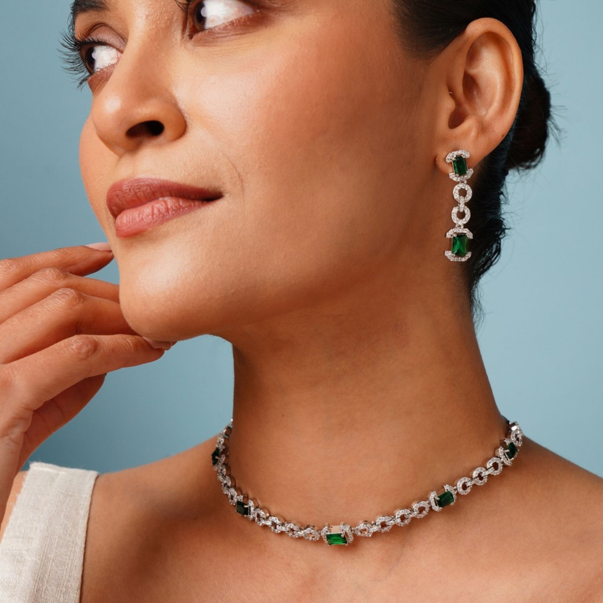 Abdesigns Jewellery Elegant Necklace with Green Gemstones on model wearing matching drop earrings and silver chain