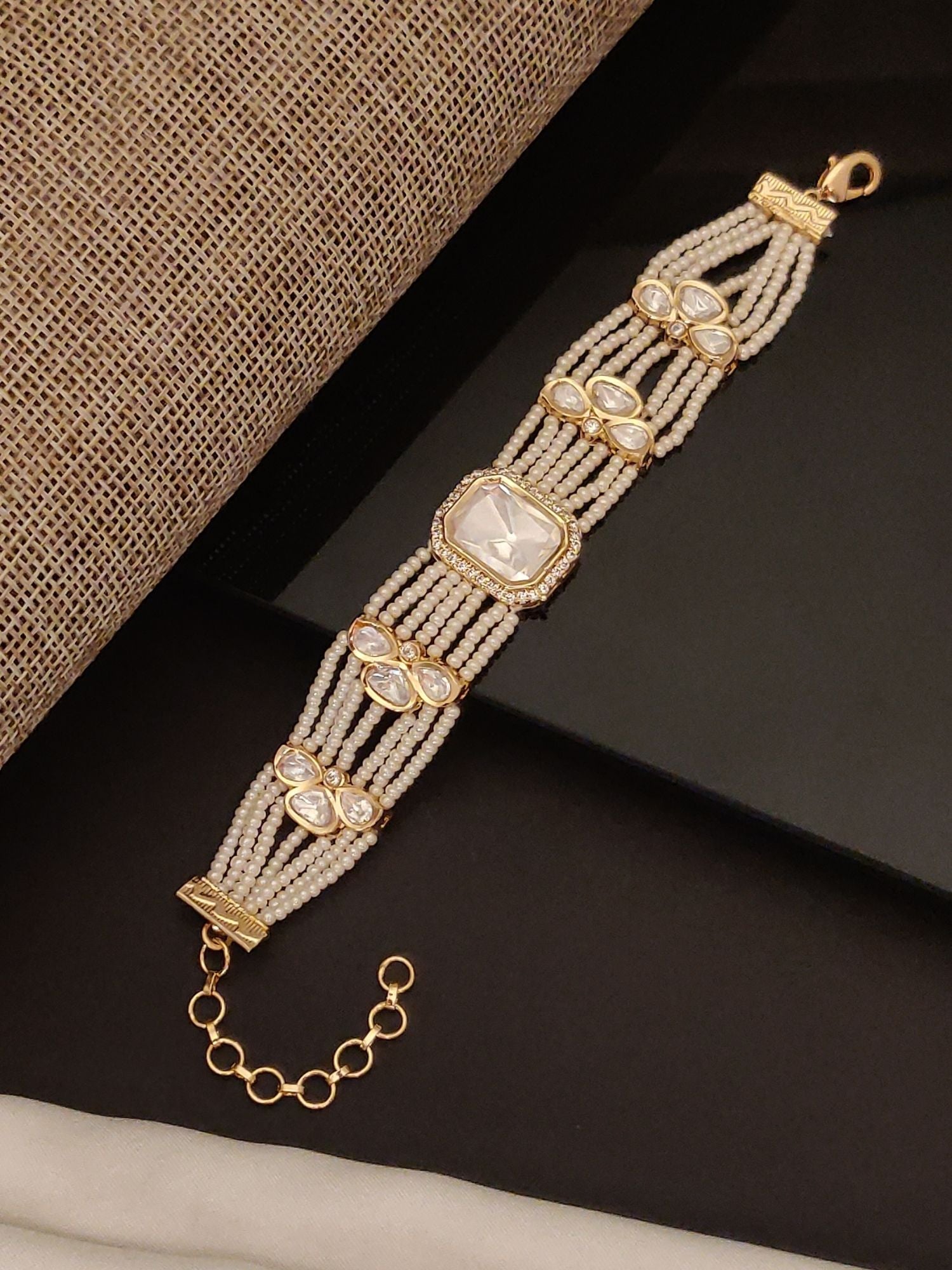 Abdesigns Jewellery Elegant Pearl & Gold Bracelet multi strand pearl bracelet with central crystal and gold accents