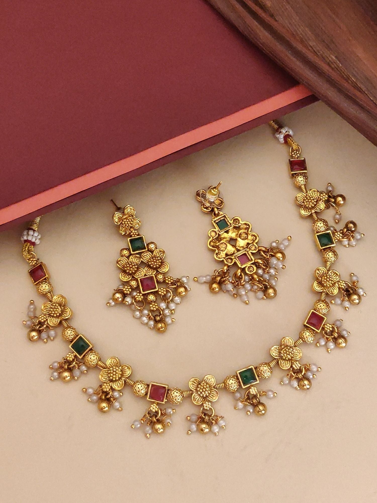 Abdesigns Jewellery Elegant Pendents Chain with Floral Design. Gold necklace red and green stones pearl drops with floral earrings
