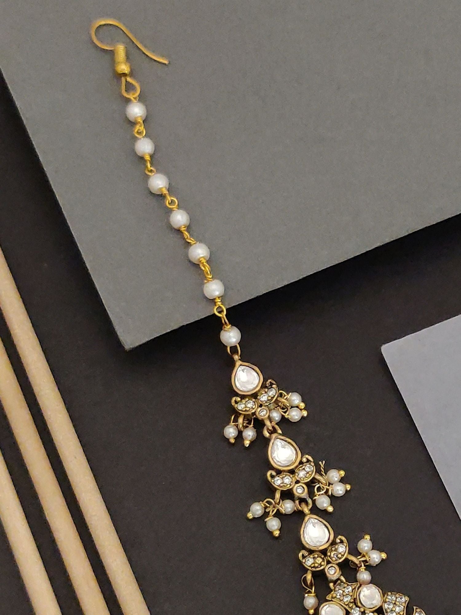 Abdesigns Jewellery Gold-Plated Kundan Pearl Maangtikka.. gold maangtikka with pearl chain, kundan stones and dangling pearls