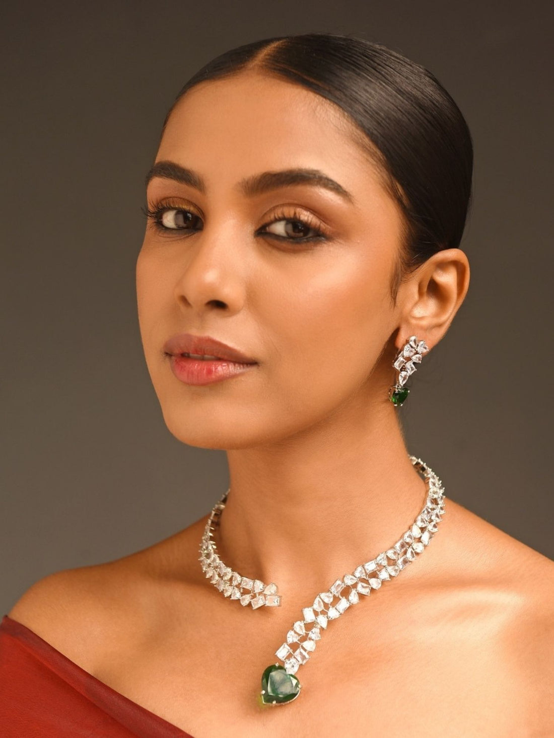 Abdesignsjewellery green heart pendant necklace with crystal chain worn by model with matching earring