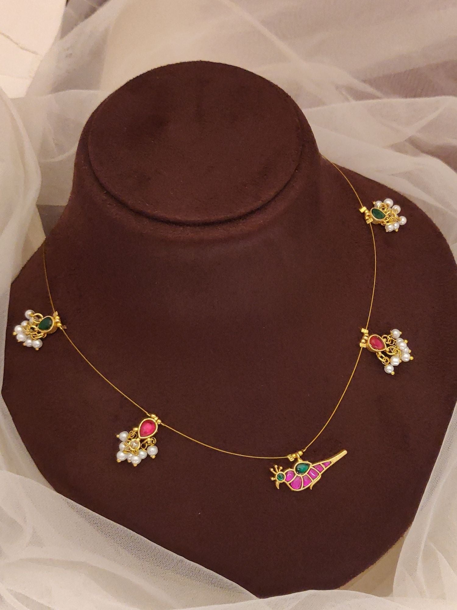 Abdesigns Jewellery Pendant Chain with Colorful Stones delicate gold chain with parrot and floral multistone pendants on bust